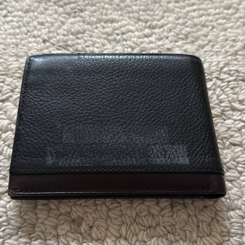Tumi Black Leather Double Billfold Wallet with Coin Holder.